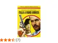 Copertina del libro "Italia a mano armata", guida al cinema poliziesco italiano, con un uomo e una donna in primo piano e una pistola.