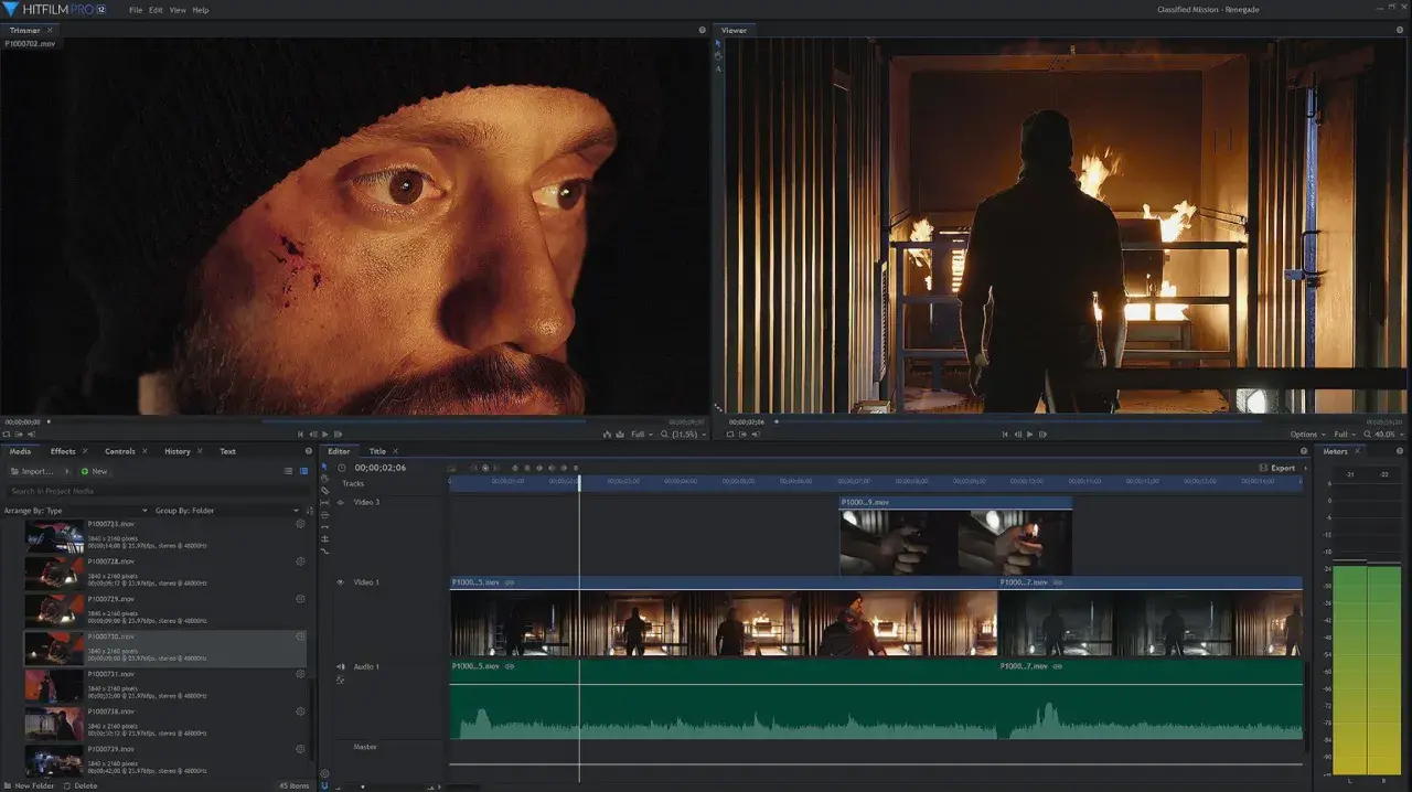 Un editor video professionale in azione, con una timeline complessa e clip che mostrano un uomo ferito e una scena di fuoco.